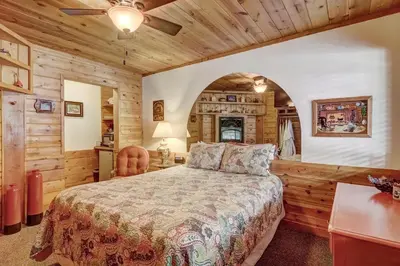 a bedroom with a bed and a desk at Heavenly Valley Lodge in South Lake Tahoe