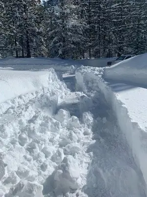 a pile of snow on the side of a road at Tahoe Cottage perfect for couples and outdoor enthusiasts in South Lake Tahoe