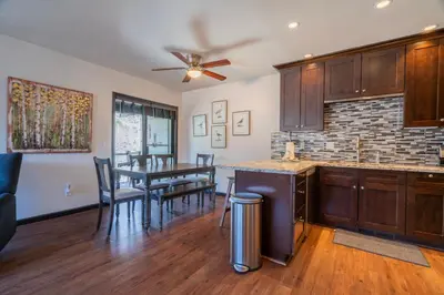a kitchen and dining room with a ceiling fan at Rr-edgewater20 in June Lake
