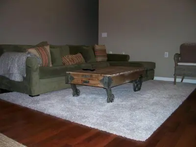 a living room with a couch and a coffee table at Elk House in June Lake