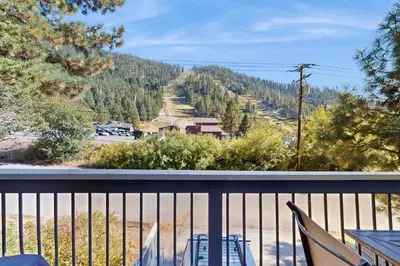 a balcony with a view of a mountain at Saddle Road Sanctuary in South Lake Tahoe