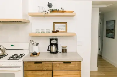 a kitchen with a stove and a counter top at Casita- Lake Area Winter Special Ends 51626 in Bass Lake