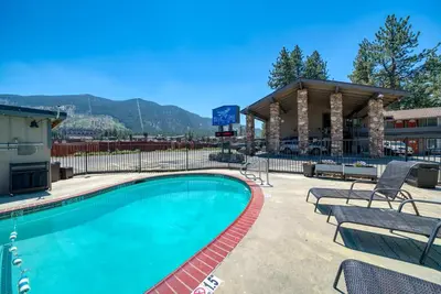 a pool at a resort with a basketball court at Blue Jay Lodge in South Lake Tahoe