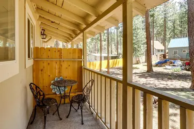 a screened in porch with a table and chairs at Welcoming South Lake Tahoe Rental Near Beaches in South Lake Tahoe