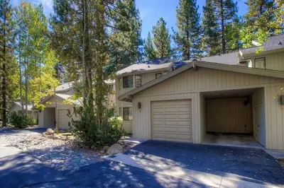 a house with a garage and a driveway at Ski Lake Lodge home in Incline Village