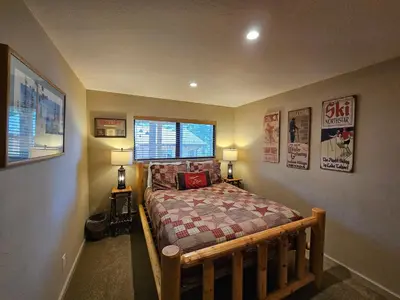 a bedroom with a bed in a room at Cozy Bear Lodge home in Incline Village