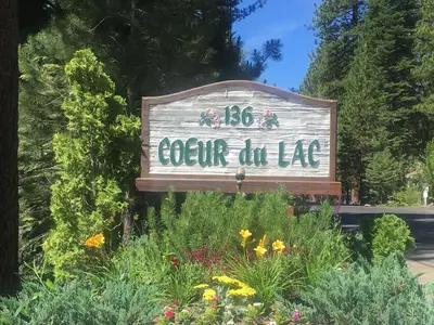 a sign for a garden on the side of a road at Pinenut Place home in Incline Village
