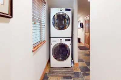 a washer and dryer in a hallway of a house at Kings Beach Retreat in Kings Beach