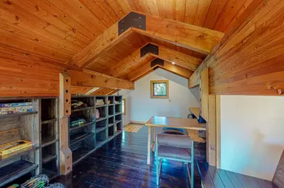 a dining room with a table and a wooden ceiling at Epic Mountain Escape in Tahoe Vista
