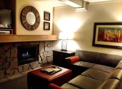 a living room with a couch and a fireplace at GetAways at the Lodge at Kingsbury Crossing in Stateline