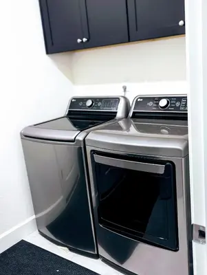 a stainless steel washer and dryer in a kitchen at Modern, Spacious & Relaxing Home in Sparks, NV in Sparks
