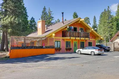 a house with a car parked in front of it at Dodge Ridge Pinecrest Mountain Cabin Near Hiking! in Cold Springs