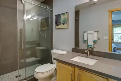 a bathroom with a toilet and a shower and a sink at Truckee Retreat with Fireplace and Community Amenities in Truckee