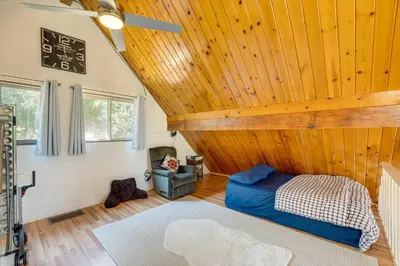 a room with a bed and a wooden ceiling at Groveland Vacation Rental about 26 Miles to Yosemite! in Groveland