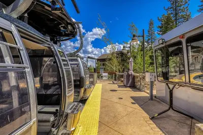 a group of buses parked at a train station at Snowscape Serenity in Truckee