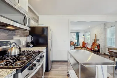 a kitchen with a stove and a counter top at Manzanita Holiday in South Lake Tahoe