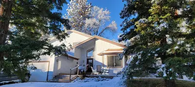 a white house in the snow with trees at Brummett Lodge Winter Special Ends 51226 in Bass Lake