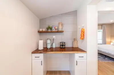 a kitchen with a counter in a room with a bed at Reno Oasis: Stylish 1-Bedroom Escape in Reno
