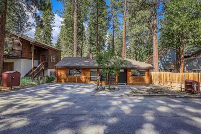 a house in the middle of a forest at Agate Bay 3BDR, Walking Distance to the Beach! in Tahoe Vista