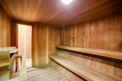 an empty sauna with wooden walls and a light at Mammoth Lakes Vacation Rental 1 Mi to Ski Area! in Mammoth Lakes