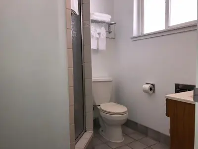 a bathroom with a toilet and a sink at Elevation Lodge in South Lake Tahoe