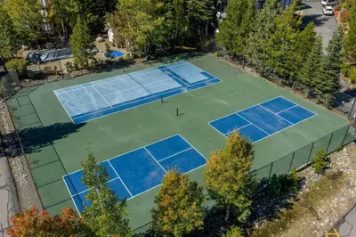 an overhead view of four tennis courts on a court at 2BDR Condo - Three Minutes to Olympic Valley! in Tahoe City