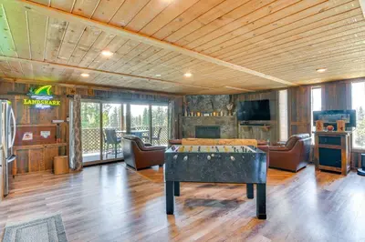 a room with a ping pong table in the middle at Game Room, Mtn Views! Unit 1 Mi to Heavenly Resort in Stateline