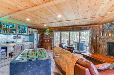 a living room with a chess board on a table at Game Room, Mtn Views! Unit 1 Mi to Heavenly Resort in Stateline