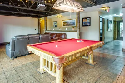 a red pool table in a room with at Game Room, Mtn Views! Unit 1 Mi to Heavenly Resort in Stateline