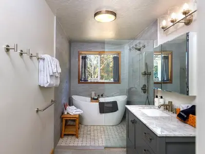 a bathroom with a tub and a sink and a shower at The Haven -In Town, NEWLY remodeled, Private, Stocked in Mariposa