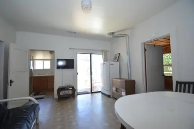a room with a kitchen and a living room at Dupzyk Lake Front Reduced Nightly Rate in Bass Lake