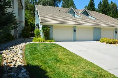 a house with a driveway in front of it at Walter- Lake AreaFree Night Special in Bass Lake