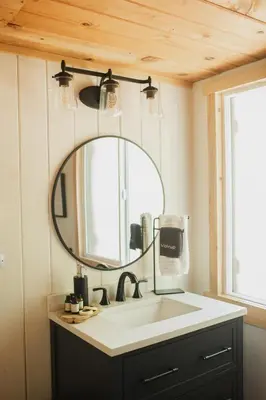 a bathroom with a sink and a mirror at Sequoia Glen in Wilsonia