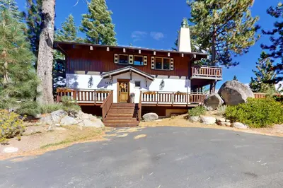 a large white house with a church at Pine Haven Retreat in Stateline