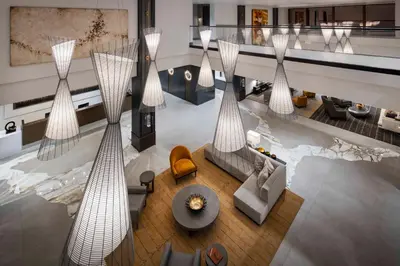 an overhead view of a living room with white furniture at Red Hawk Resort & Casino in Placerville