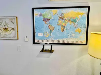 a map of the world hanging on a wall at Butterfly Suite Hot Tub BBQ Private in Ahwahnee