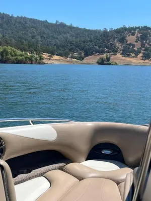 a boat on a large body of water at Executive home in a serene park like setting in Folsom