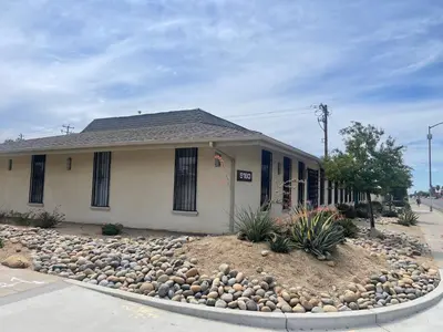 a house with a rock garden in front of it at Fresno Vacation Rental 106 in Fresno