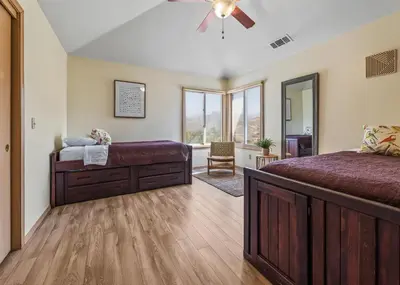 a bedroom with a bed and a ceiling fan at Number 1! PARADISE Getaway - Sequoia Alta Vista in Three Rivers