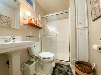 a bathroom with a shower and a toilet and a sink at Sweet Home in Sacramento Only 2mins to Freeway in Sacramento