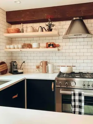 a kitchen with a stove and a counter top at Mid Century Modern Cabin - The Tahoe A-Frame in Homewood