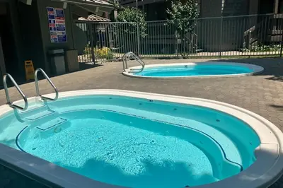 a hot tub in the middle of a yard at Sierra Park Villas 39 H in Mammoth Lakes