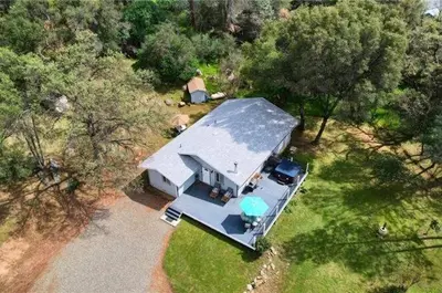 an overhead view of a tiny house in the woods at Brookside Cottage in Mariposa