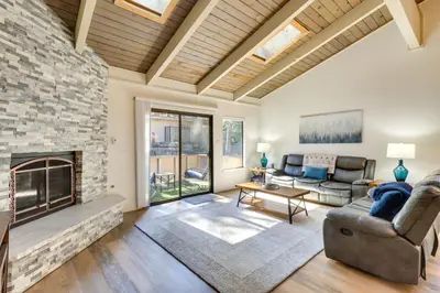 a living room with a couch and a fireplace at Stylish Incline Village Vacation Rental with AandC! in Incline Village