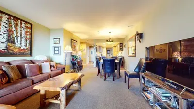 a living room with a couch and a table at Bridges #108 condo in Mammoth Lakes