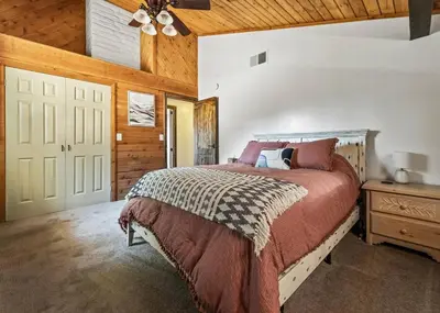 a bedroom with a bed and a wooden ceiling at Scenic Spanish Rancho - Breathtaking Views in Three Rivers
