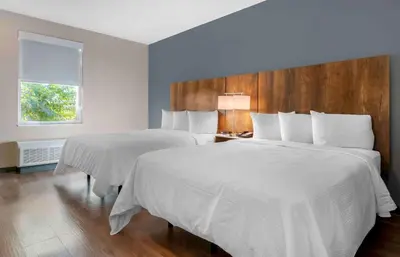 a hotel room with two beds and a window at Extended Stay America Premier Suites - Reno - Sparks in Sparks