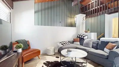 a living room with a couch and a table at Lakeview Lodge #1 condo in Mammoth Lakes