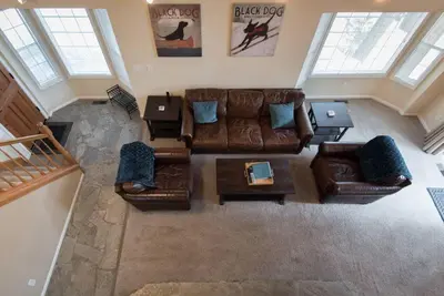 an overhead view of a living room with a leather couch at Tahoe Vista Home w/ Spa close to Northstar & Lake in Tahoe Vista