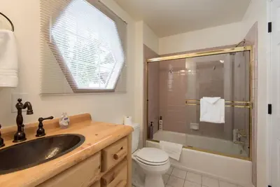 a bathroom with a sink and a shower and a toilet at Tahoe Vista Home w/ Spa close to Northstar & Lake in Tahoe Vista